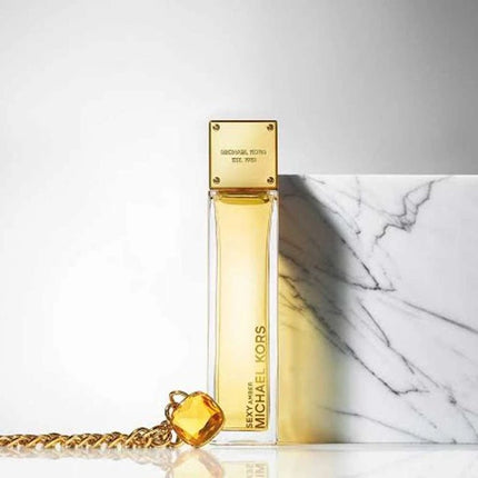 عطر مايكل كورس سيكسي امبر او دو بارفان ١٠٠ مل للنساء