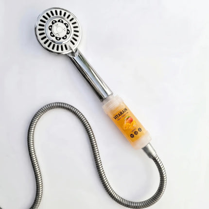 VITARAIN Korean Vitamin C Shower Filter in Mango scent for reducing chlorine and improving shower water, فلتر الشور الكوري بفيتامين C من فيتارين برائحة المانجو لتقليل الكلور وتحسين ماء الشور